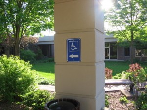 Sign pointing to accessible entrance